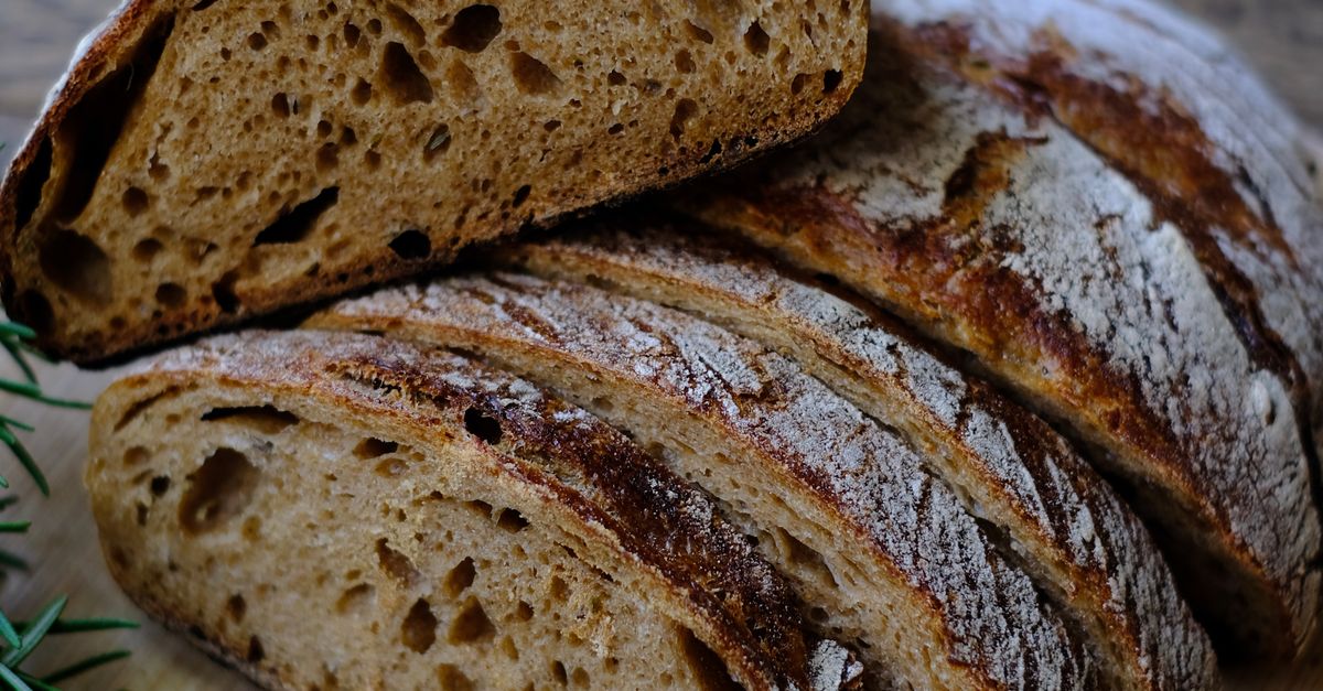 Close-up of a crusty sliced sourdough loaf